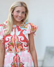 Load image into Gallery viewer, Woman wearing a colorful dress with a white background