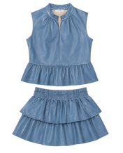 Load image into Gallery viewer, A two-piece children's outfit set consisting of a sleeveless high-neck top with a ruffled hem and a matching tiered ruffle skirt, both in a glossy dusty blue faux leather material, shown on a plain white background.
