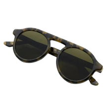 Load image into Gallery viewer, Round sunglasses with tortoiseshell frame and dark lenses on a white background